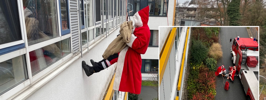 Nikolaus seilt sich mit Hilfe der Feuerwehr von der Kinderklinik ab